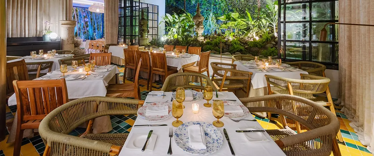 Elegant restaurant interior with tables set up in Puerto Vallarta restaurant.