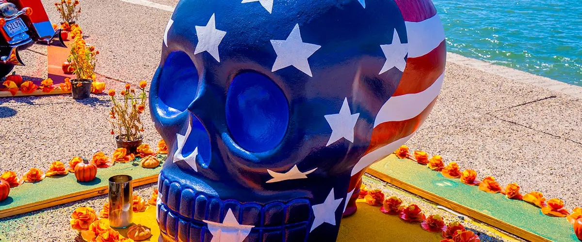 Giant Day of the Dead skull painted with the American flag on the Puerto Vallarta boardwalk